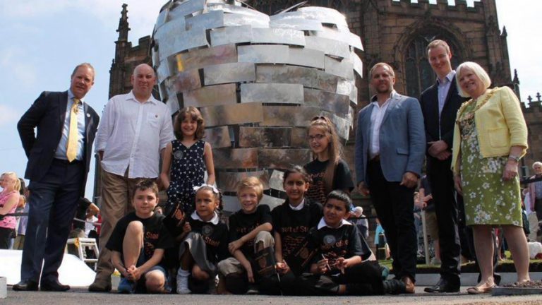 A photograph from the Heart of Steel grand opening in Rotherham. The Heart of Stel will be engraved with messages from the public and displayed with the landmark sculpture The Steel Man.