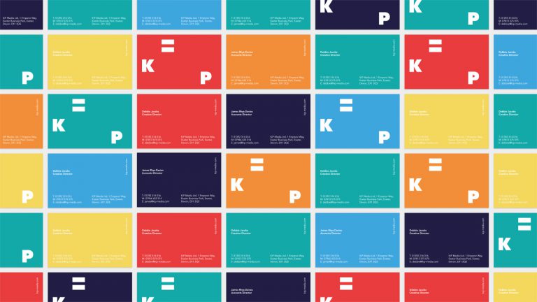 Business card designs by Born + Raised for KiP Media.