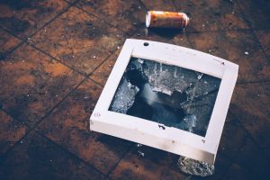 A photograph of a broken computer screen.
