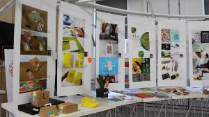 Sheffield Hallam University's Degree Show - a row of hanging banners depicting work- with Born and Raised