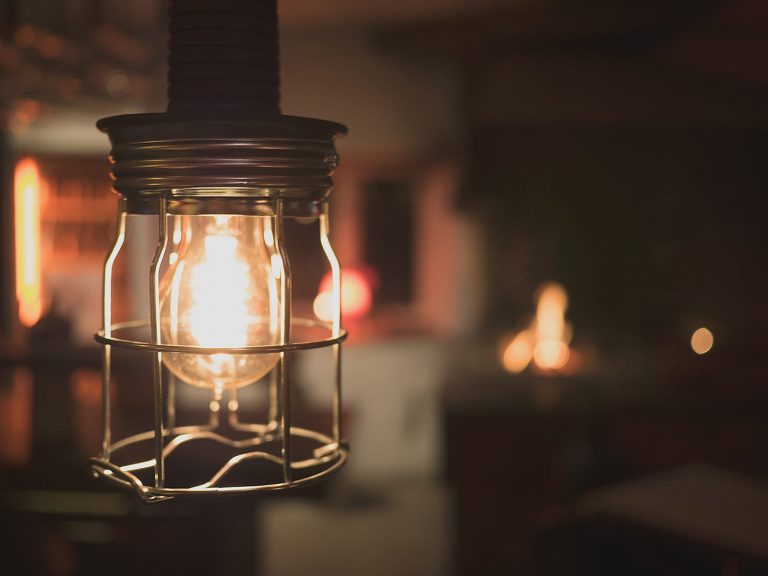 Changing the way we work online - Born and Raised- an image of a lightbulb with a wire cage surrounding