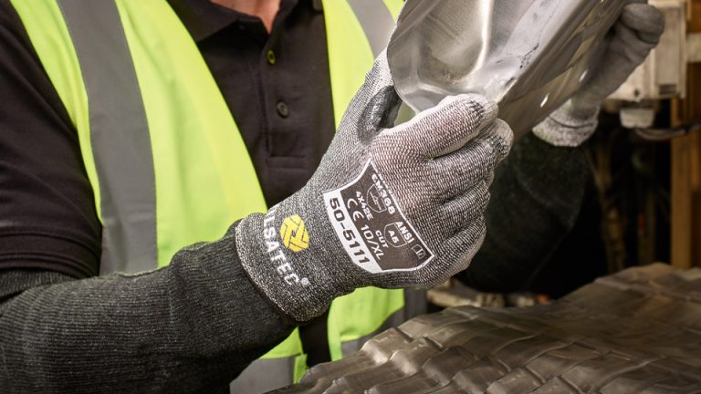Tilsatec branded glove designed by Born and Raised