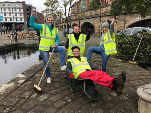 Tamaris Roberts, Office Manager, Marianne MacKenzie, Account Director, Chlow Lowe, Head of Digital and Sam Lightfinch, Copywriter, all helping to tidy the grounds around Born and Raised