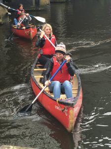 The Born and Raised team rowing boats