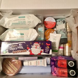 An assortment of toiletry products in a box