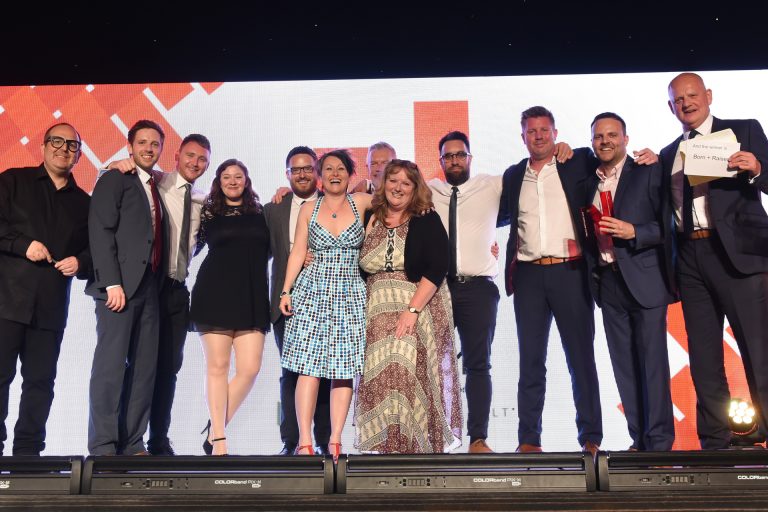 Photo of the Born and Raised team accepting the Prolific North award