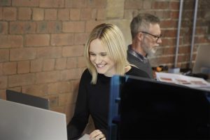 Chloe Lowe, Head of Digital at Born and Raised, happy at work