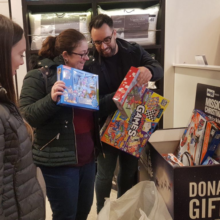 Harriet Aisthorpe. Helen Stavri and Abbas Arezoo from Born and Raised, donating toys bought